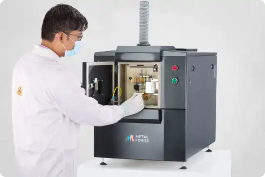Technician operating Metal Power spectrometer for metal analysis in laboratory