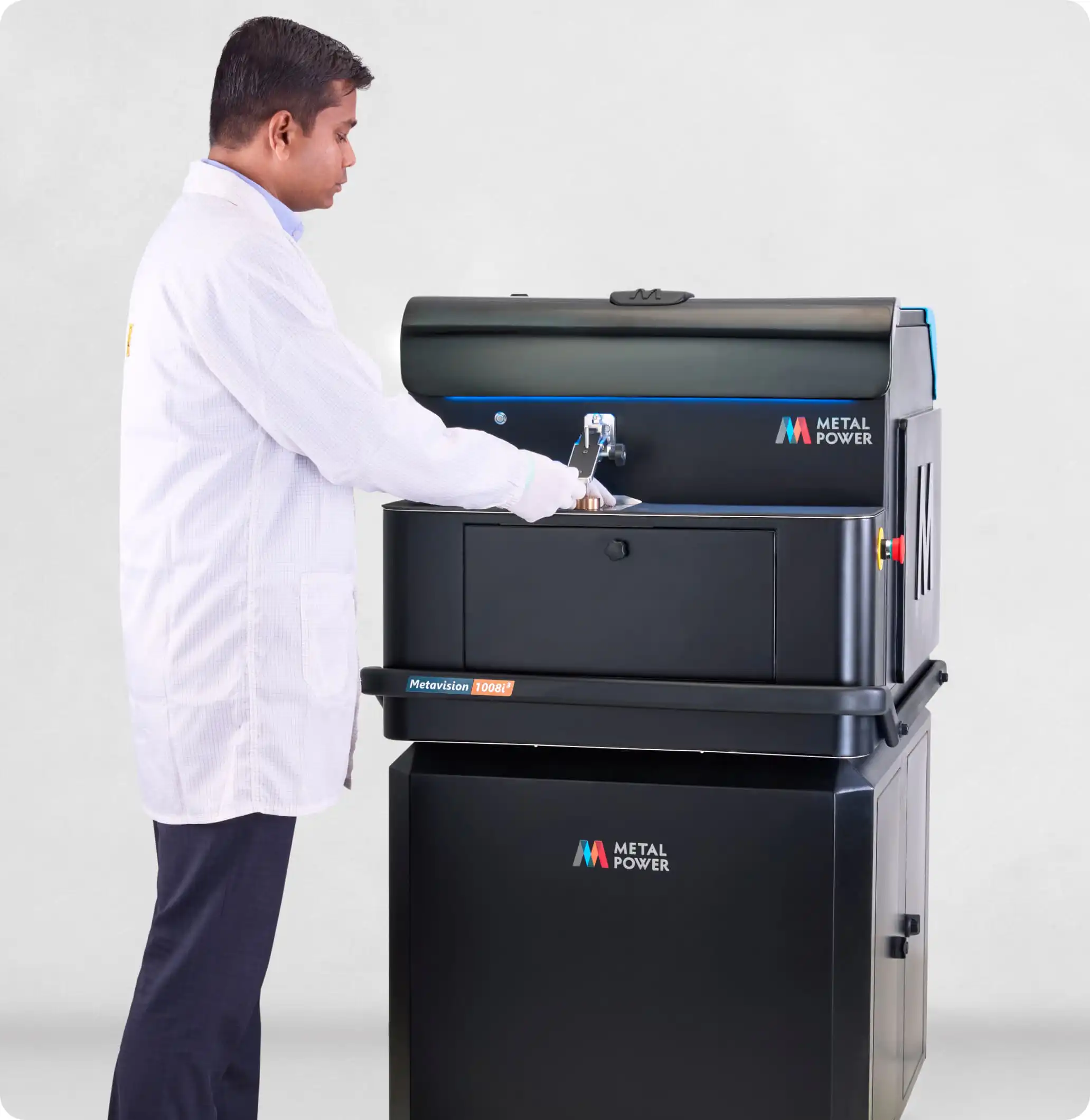 Technician using Metal Power optical emission spectrometer